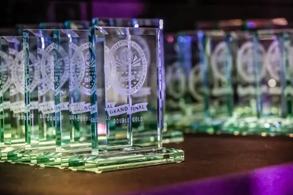 Rows of bis Grand Final glass awards engraved Double Gold