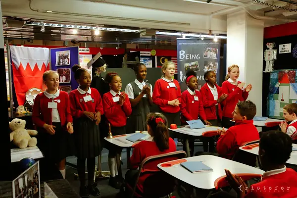 Pupils in red uniforms in the schools area at the British Invention Show 2014