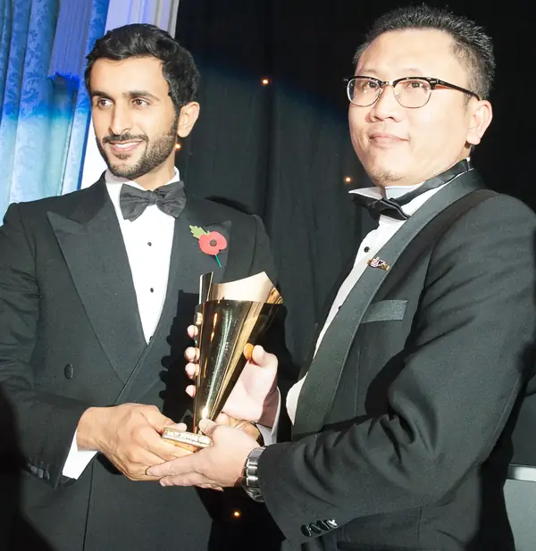 Gold trophy cup presented on stage at the 2014 bis Awards at The Savoy