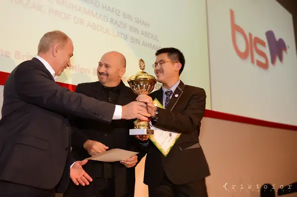 Gold cup presented on stage at the British Invention Awards 2013